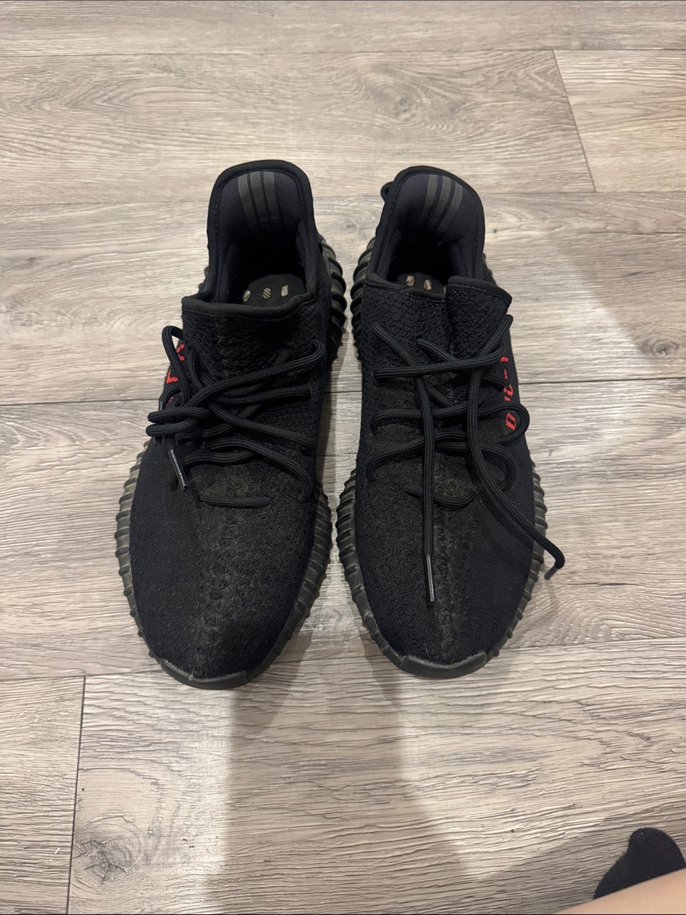 YEEZY Black Knit Athletic Sneakers with Red Accent
